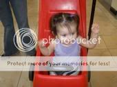 boo in the racecar stroller at the mall